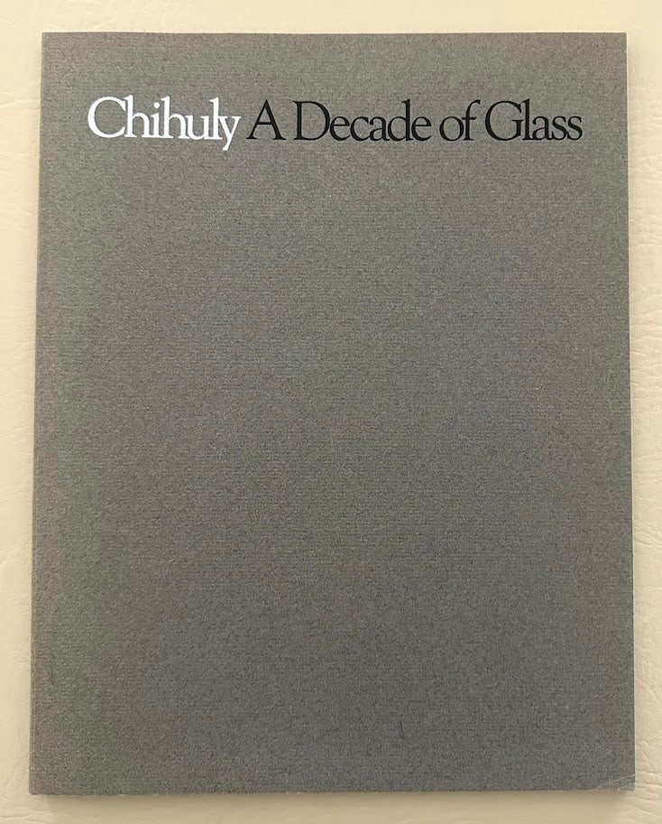 Chihuly A Decade of Glass. Text by Jack Cowart and Karen Chambers.: Bellevue: 1984. 4to; 64pp; printed card covers; illustrated with color images; apparent first edition; fine copy. Signed by Chihuly and unidentified name.