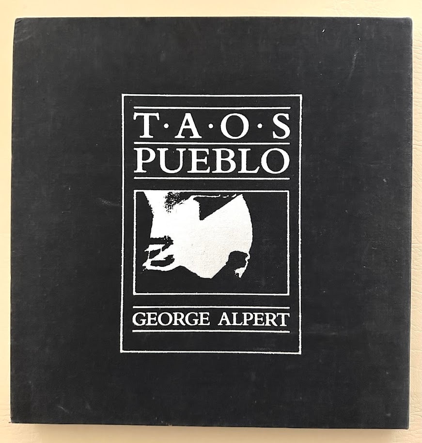 Taos Pueblo. Text and photos by George Alpert.: Scottsdale: 1983. Large 4to; silver decorative cloth; decorative jacket; illustrated with numerous images; fine copy in the original publisher's slipcase. First edition.
