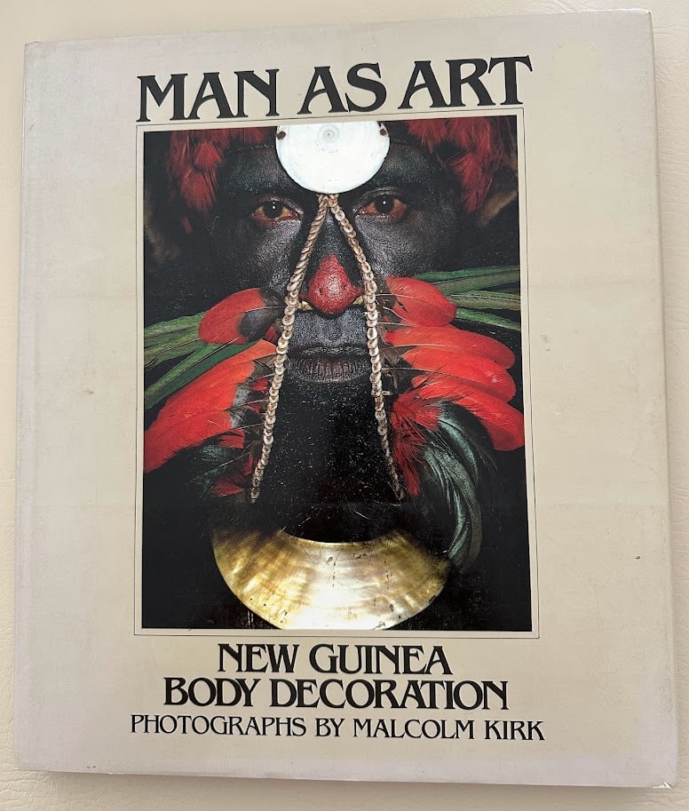 Man as Art. New Guinea Body Decoration. Introduction by Andrew Strathern.: London: 1981. Small folio; 47pp; heavy cloth; color illustrated jacket, slightly worn at edges, otherwise very good. Large section of illustrations after the text. First edition. Provenance: New Guine