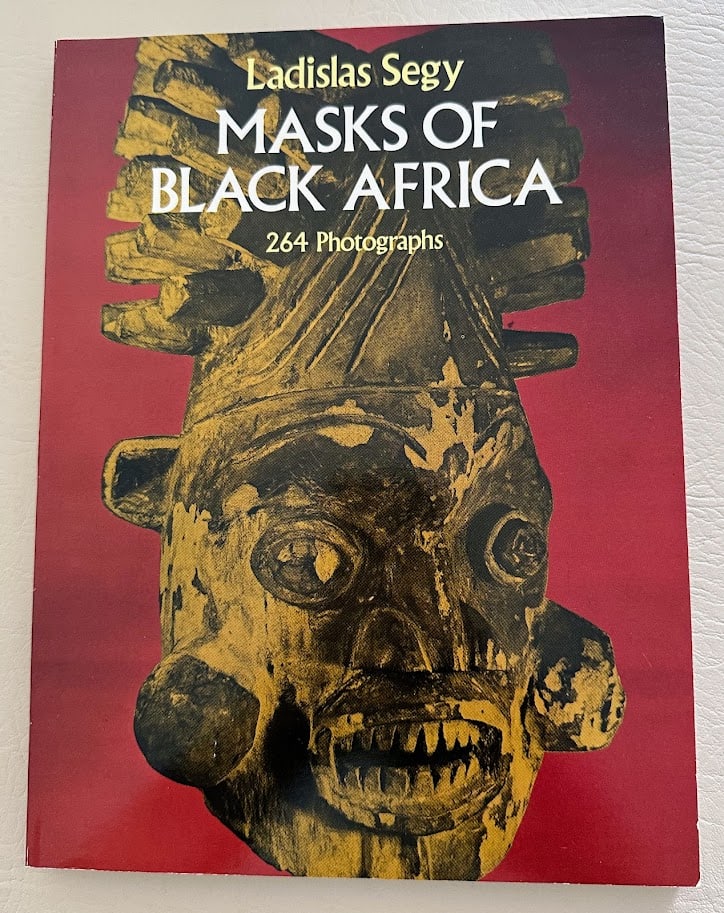 Masks of Black Africa. Text by Ladislas Segy.: New York: 1976. 4to; 248pp; color pictorial card wrappers; with numerous b/w photographs; fine copy.