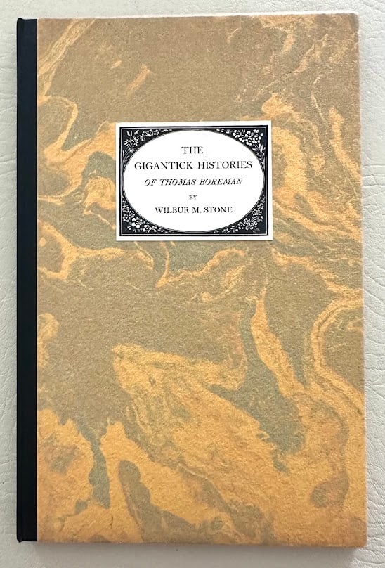 The Gigantick Histories of Thomas Boreman, by Wilbur Macy Stone.: Portland: 1933. 8vo; 41pp; cloth backed decorative boards; illustrated; fine copy in the original slightly worn and chipped glassine jacket. First edition, limited to 250 numbered copies signed by Sto