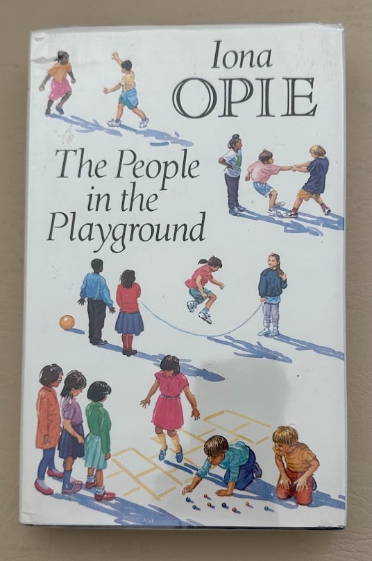 Iona & Peter Opie. The People in the Playground.: London: 1993. 8vo; 240pp; cloth; color pictorial jacket; illustrated; fine copy. First edition. Half title page with signed and dated presentation from Iona Opie; laid in is a ex libris card signed by