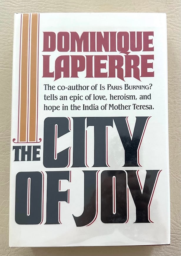 The City of Joy, by Dominique Lapierre.: New York: 1985. 8vo; 464pp; cloth backed boards; fine copy in the printed jacket. First American edition.