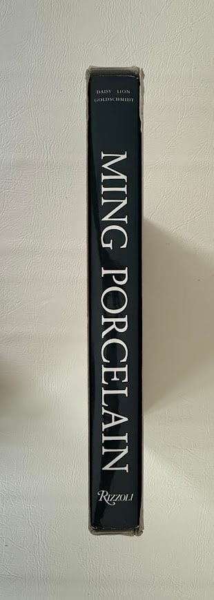 Ming Porcelan, by Daisy Lion-Goldschmidt.: New York: Rizzoli, 1978. Small folio; 291pp; cloth; color pictorial jacket; illustrated throughout in color and b/w; fine copy in the original slipcase. First American edition.
