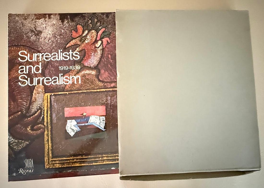 Surrealists and Surrealism 1919-1939, by Gaetan Picon.: New York: 1977. Small folio; 231pp; printed cloth; color pictorial jacket; illustrated throughout; fine copy in the original card slipcase - bottom slightly defective. First American edition.