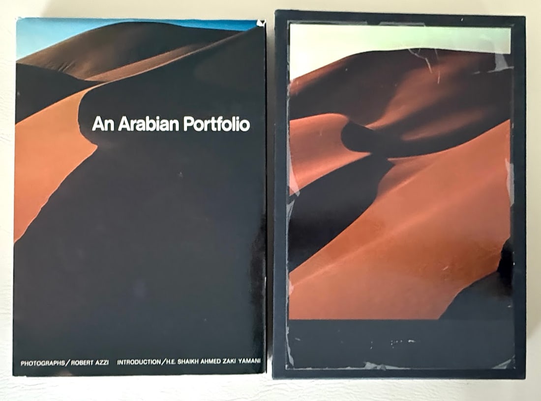 An Arabian Portfolio, by Robert Azzi.: Saudi Arabia: 1976. Folio: 223pp; decorative cloth; decorative jacket; illustrated throughout with color photographs; jacket rubbed at corners; a slight musty odor, otherwise a very good copy in the o