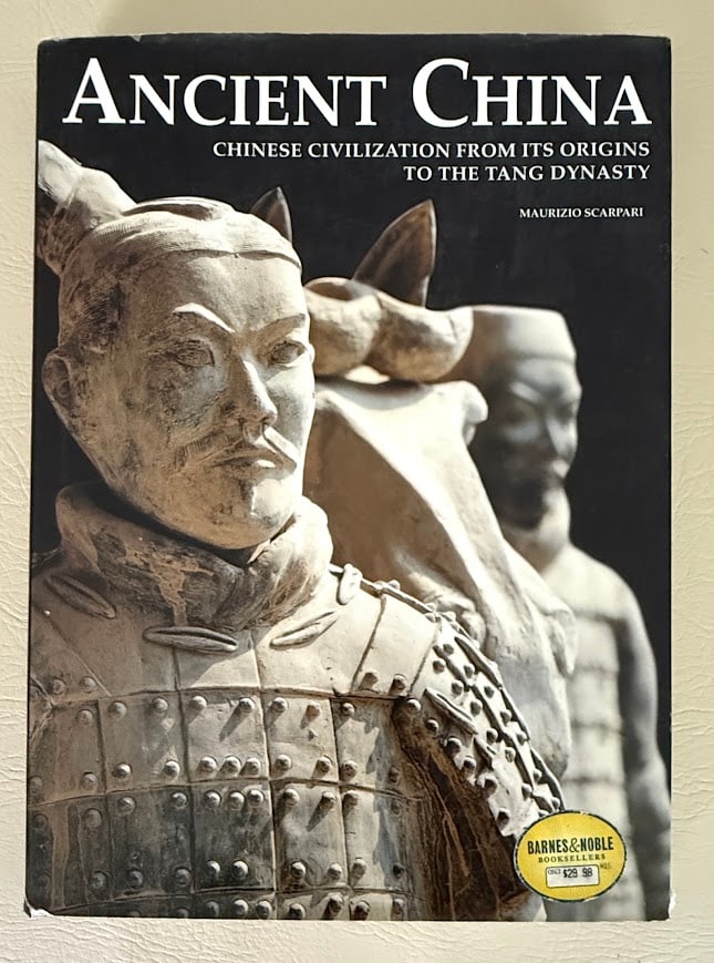 Ancient China. Chinese Civilization from the Origins to the Tang Dynasty, by Maurizio Scarpari.: New York: 2000. Folio; 291pp; gilt lettered cloth; color pictorial jacket; profusely illustrated; jacket with a 2 inch tear at bottom edgeworn along edges and at corners; otherwise a very good copy.