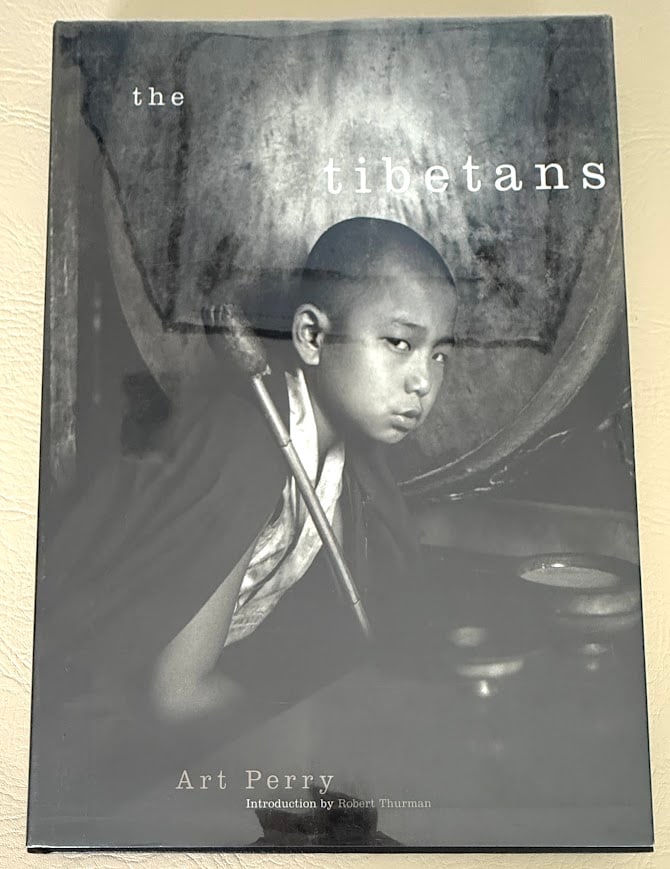 the tibetans, photographs, by Art Perry.: New York: 1999. 4to; 153pp; cloth; pictoria jacket; illustrated throughout; fine copy. First edition.