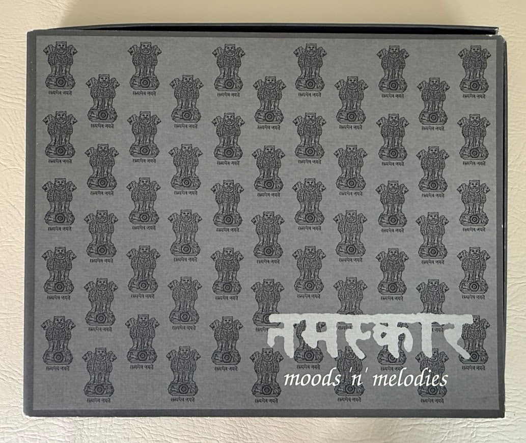 [India] Moods 'n' Melodies.: Veneto: Marco Polo Systems, 1994. Oblong 4to; 159pp; decorative boards; decorative jacket; illustrated with numerous color & b/w photographs; fine copy in the original publisher's box; complete with t