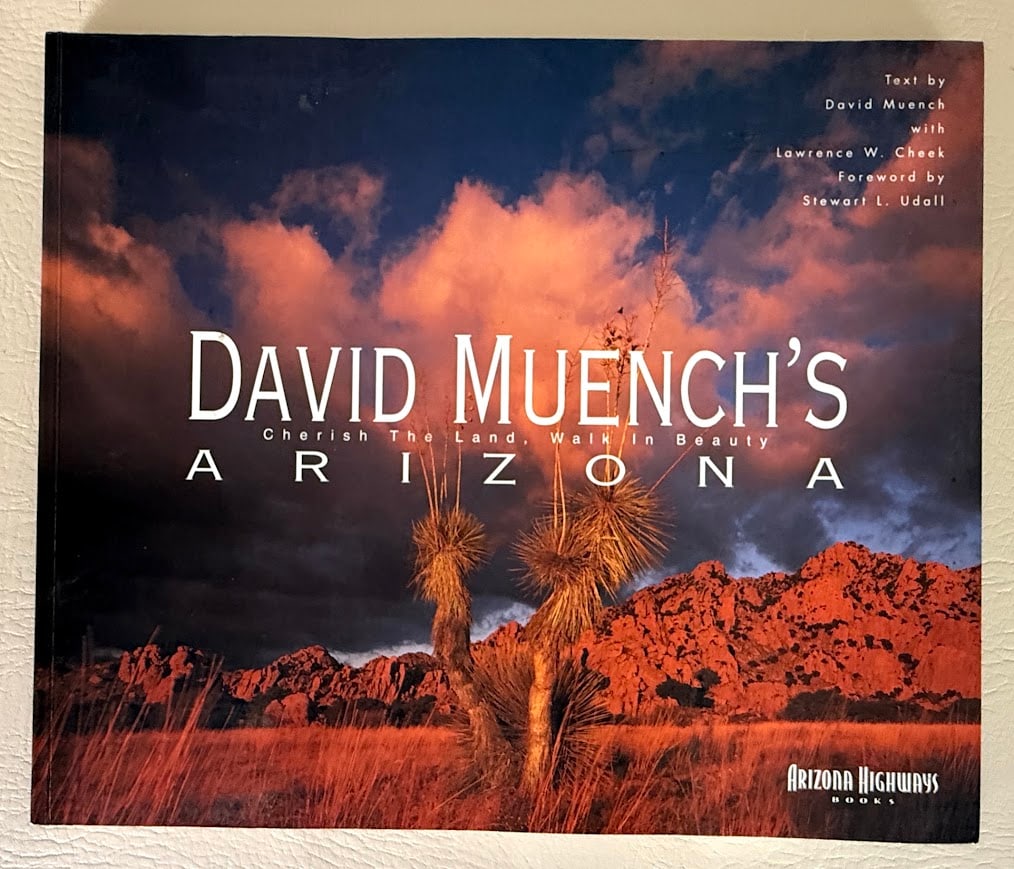 David Muench. David Muench's Arizona. Cherish the Land, Walk in Beauty.: Phoenix: Arizona Highways, 2000. Large oblong 4to; 143pp; color pictorial card covers; illustrated with numerous color photographs; SIGNED by David Muench on a special label.