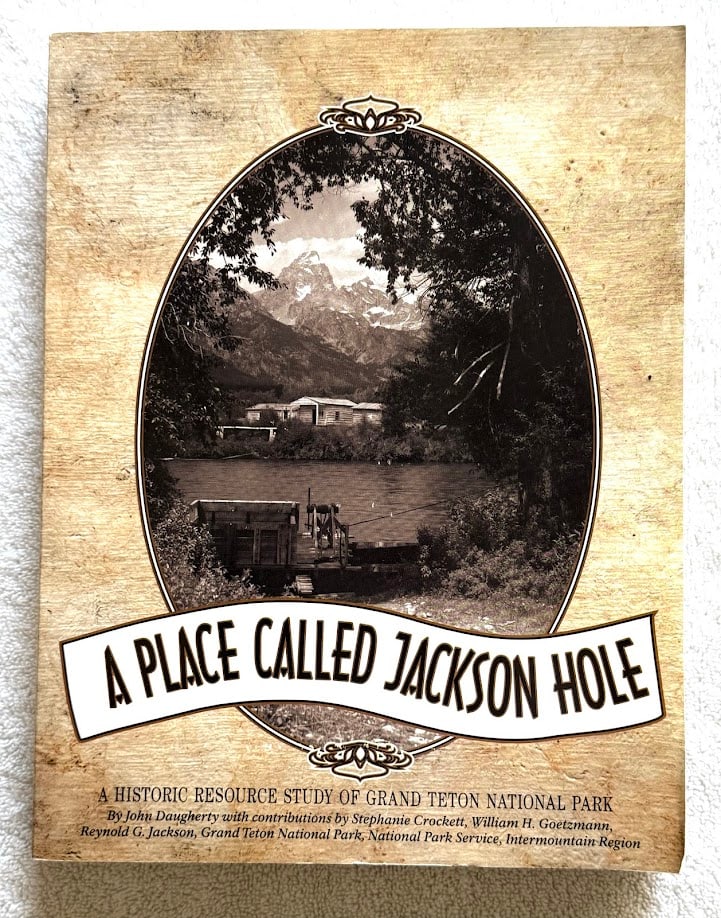 John Daugherty. A Place Called Jackson Hole. The historic resource study of Grand Teton National: Grand Teton National Park Service, 1999. 4to; 403pp; pictorial card covers; with numerous illustrations; inner hinge cracked at pages 126-127, otherwise a very good copy in the original pictorial card