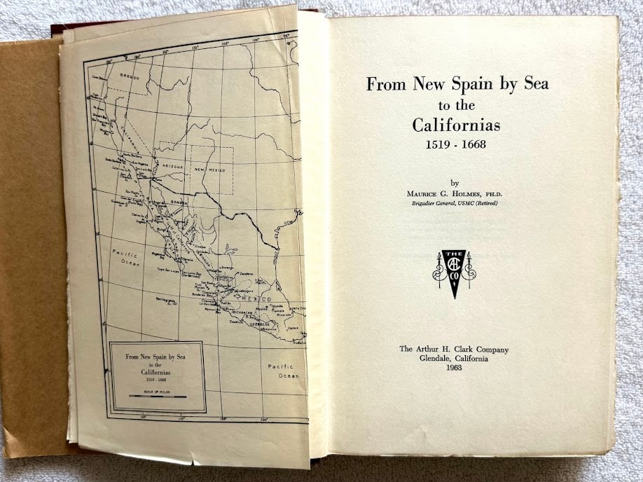 Maurice Holmes. From New Spain by Sea to the Californias 1519-1668.: Glendale: 1963. 8vo; 307pp; gilt lettered cloth; with numerous illustrations and a large folding map; small light ink stamp of the Arizona Historical Association, otherwise a fine copy in the