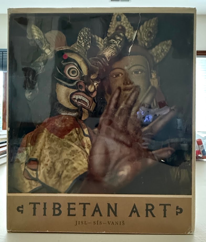 Tibetan Art, by Lumir Jisl.: London: 1958. 4to; 40pp; gilt decorative cloth; pictorial jacket; illustrated with 111 plates; jacket with one abrasion, one 1 inch tear and light wear to edges, otherwise very good.