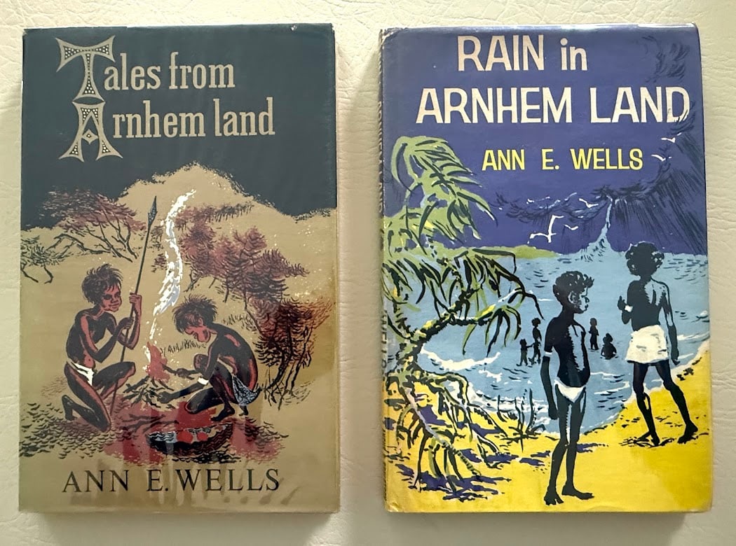 Ann E. Wells. Tales from Arnhem Land / Rain in Arnhem Land. Two volumes.: Sydney: 1959-1961. 8vo; 98pp-87pp; first volume bound in cloth; second volume bound in color pictorial boards; color pictorial jackets; illustrated by Margaret Paice; gutter of jacket and edge with a