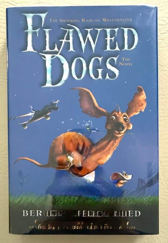 Berkeley Breathed. Flawed Dogs the Novel.: New York: 2003. 8vo; 216pp; cloth; color pictorial jacket; with full page color, half page and b/w other illustrations; Fine copy. First printing. SIGNED by the author on the title page.