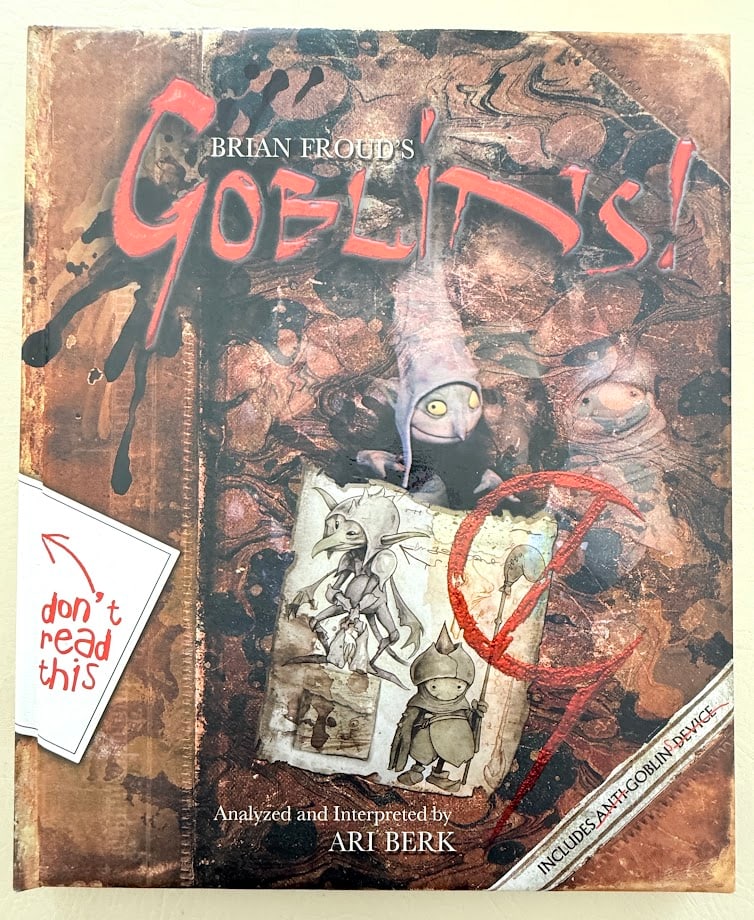 Brian Froud. Goblins! A Survival Guide and Fiasco in Four Parts. By Ari Berk.: New York: 2004. 4to; highly colored padded covers; with numerous illustrations by Brian Froud; first printing; fine copy. SIGNED by Froud and Berk on the title page.