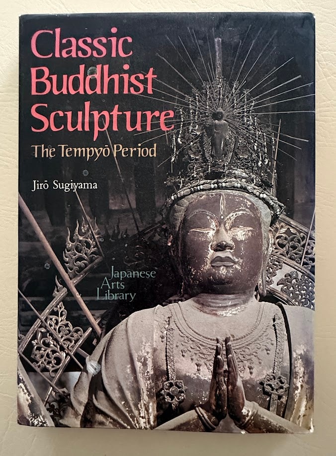 Classic Buddhist Sculpture. The Tempyo Period, by Jiro Sugiyama.: Tokyo: Kodansha, 1982. 4to; 230pp; decorative cloth; pictorial jacket; illustrated with numerous color and b/w photographs; covers and blank side of jacket with a few small stains; front fly leaf with