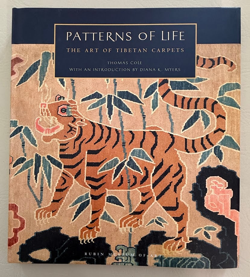 Patterns of Life. The Art of Tibetan Carpets, by Thomas Cole.: New York: Rubin Museum of Art, 2010. Large 4to; 104pp; color pictorial boards with matching jacket; illustrated throughout; fine copy.