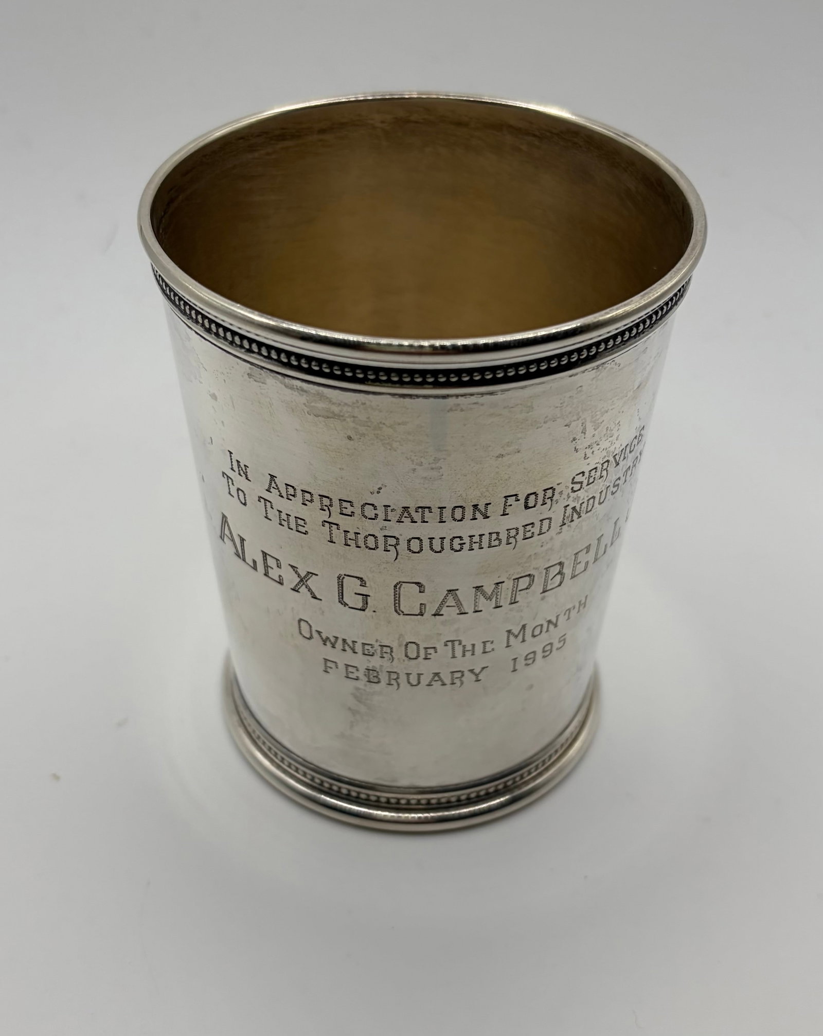 Presidential Sterling Silver Julep Cup by Mark Scearce: Mark Scearce Presidential sterling silver julep cup monogrammed honoring Alex G Campbell for his service to the thoroughbred industry. It is marked WJC for Clinton on the bottom, weighs 168.67 grams a