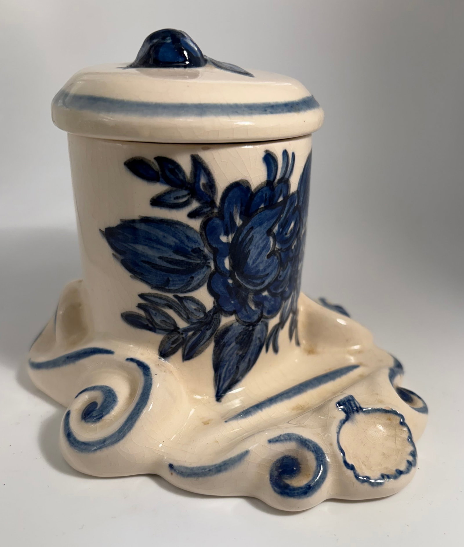 Antique Delft Majolica Inkwell: A ceramic Majolica Delft inkwell. Measures approximately 4.5” tall, 5” wide and 5.5” deep.
