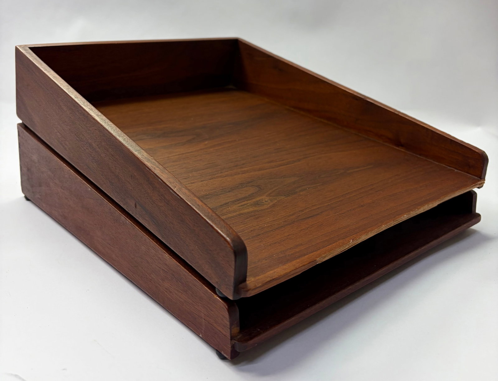 Pair of Jens Rison Walnut Paper Trays: A set of clsssic mid-century modern walnut letter trays designed by Jen Rison. Each tray measures 11” X 14” X 3” deep