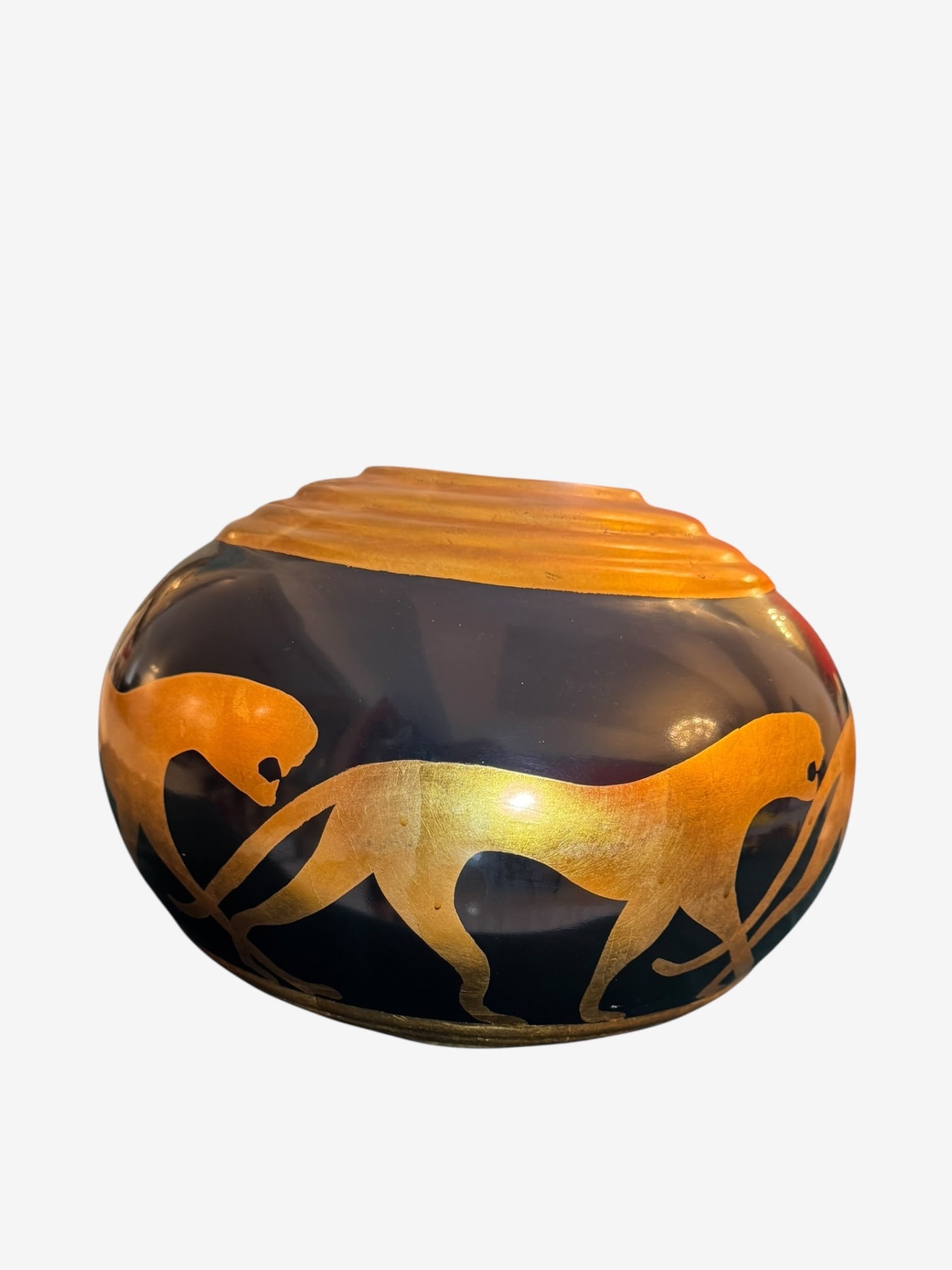 Hollywood Regency Egyptian Style Panther Vase: Hollywood Regency style vase is a stunning piece of art pottery. The glossy black and gold ceramic vase features an all-over panther pattern.
