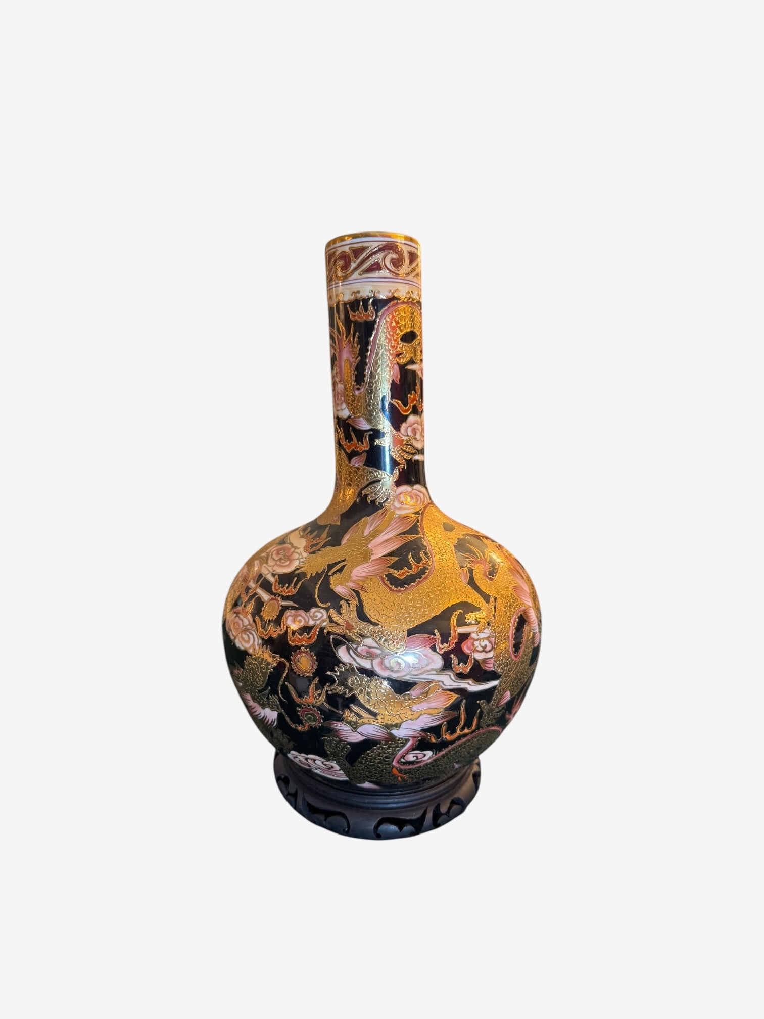 Chinese Famille Rose Black Ground Dragon Vase: Large baluster porcelain vase featuring high-relief gold dragons on a black ground. Decorated with peonies and clouds.
