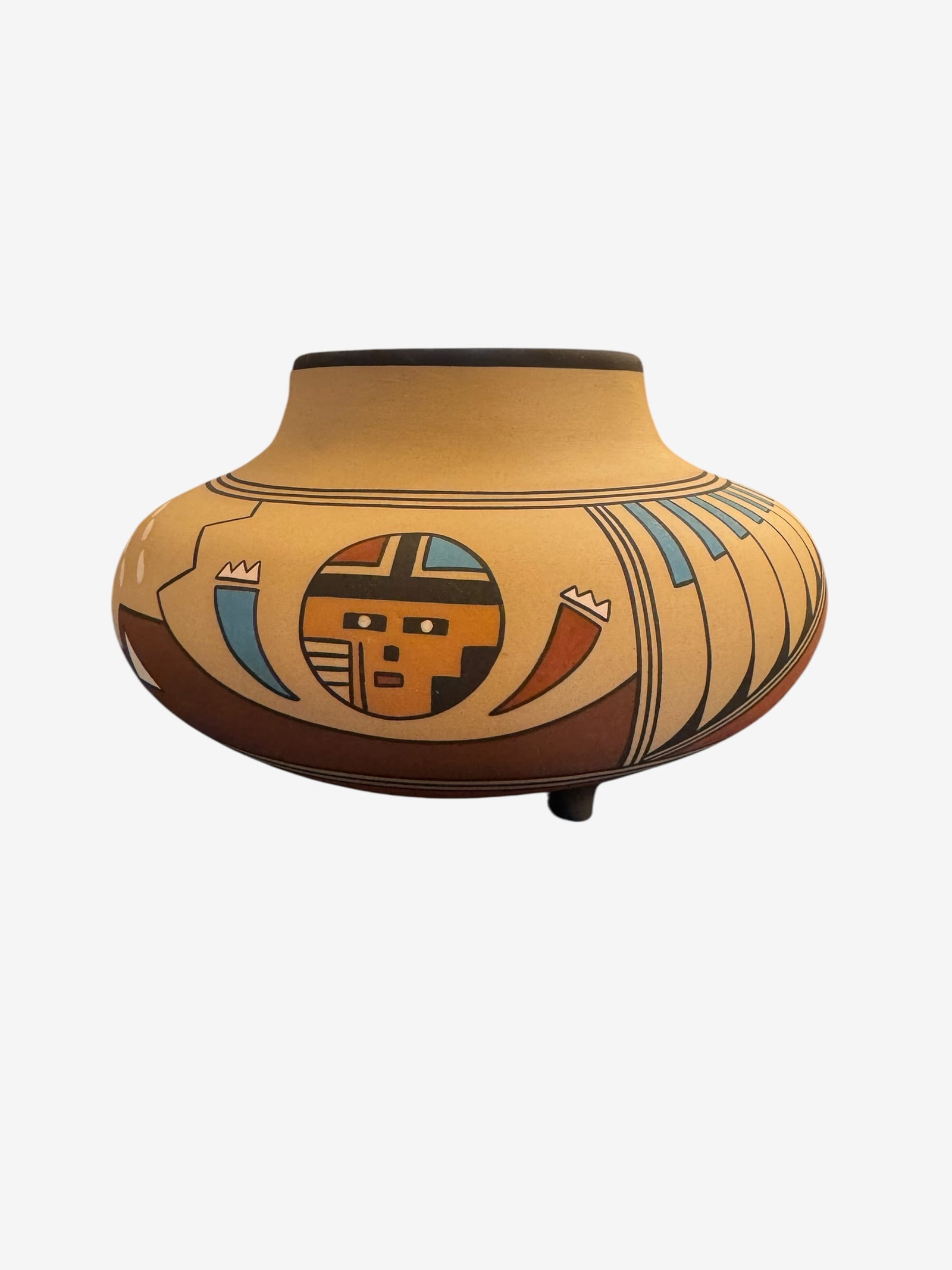 "Aadam" Southwestern Studio Pottery Tripod Bowl: Southwestern studio pottery footed bowl signed "Aadam". Decorated with geometric and feather motifs in earth tones.