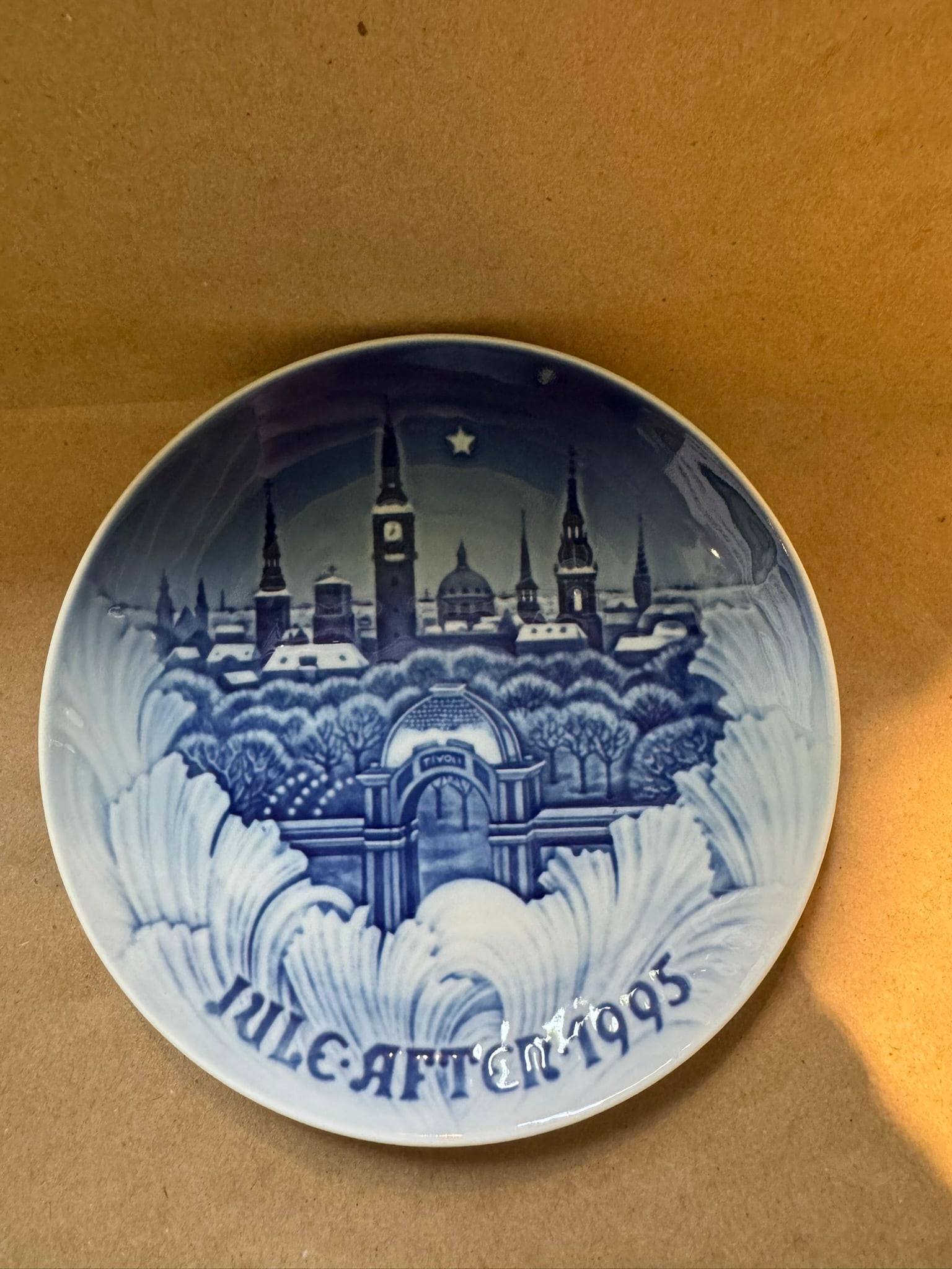 1995 - The Towers of Copenhagen: COA -Up for auction is a pristine Bing & Grondahl Christmas Plate titled '1995 - The Towers of Copenhagen'. This exquisite collector's item was originally issued in the year 1995. Featuring the