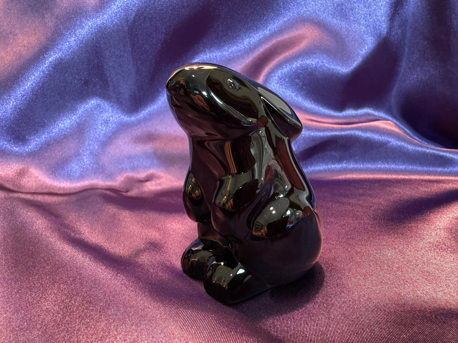 Baccarat Black Crystal Bunny Rabbit Figurine: Charming and sleek opaque black crystal rabbit figurine by Baccarat. A highly reflective, stylized modern design piece that adds striking contrast.