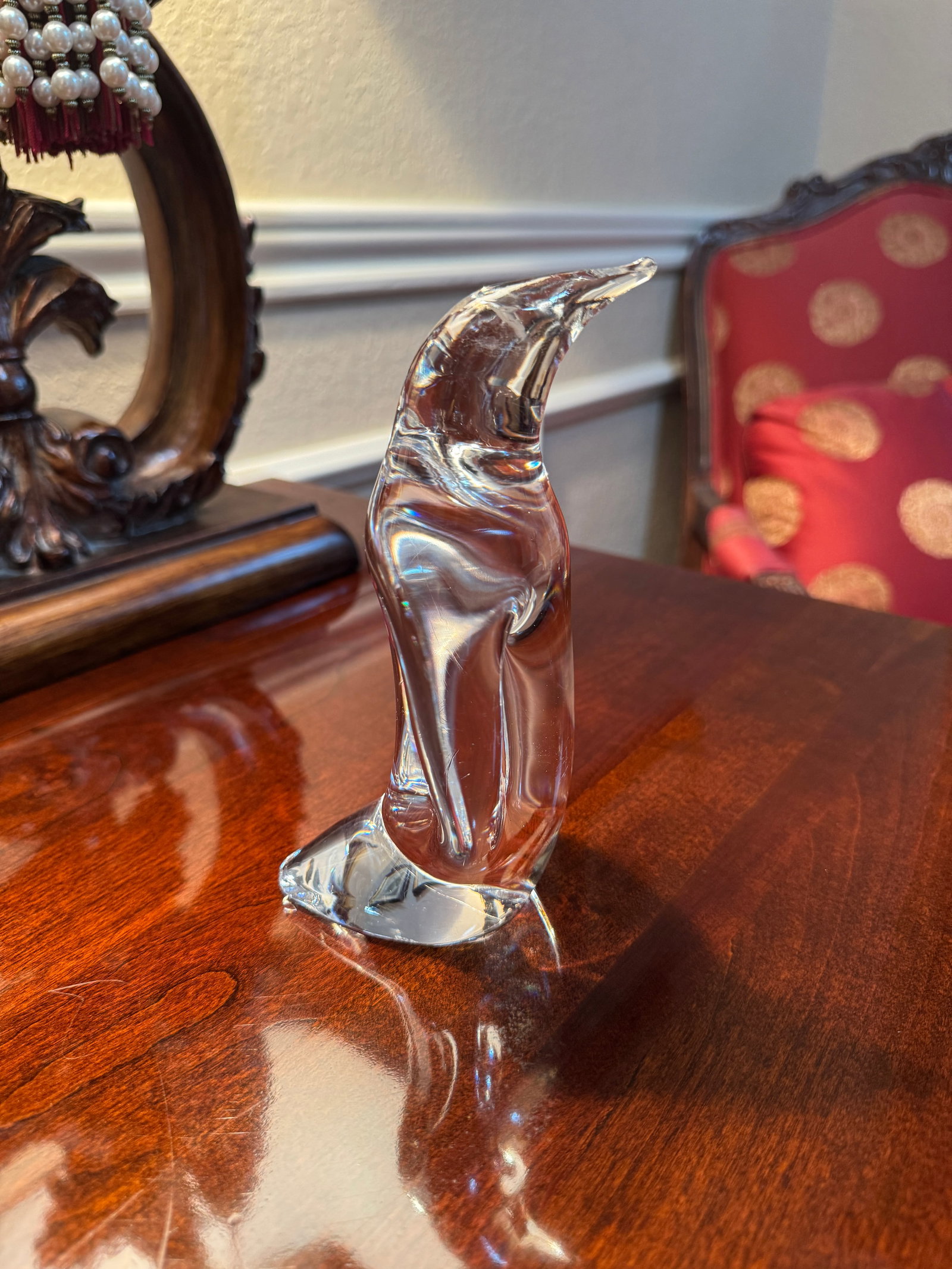 Fine Clear Crystal Penguin Figurine: A charming, heavy clear crystal penguin figurine with a fluid, modern aesthetic. Excellent clarity and weight, perfect for any art glass collection. Unbranded. Tiny scratch on back that's hardly