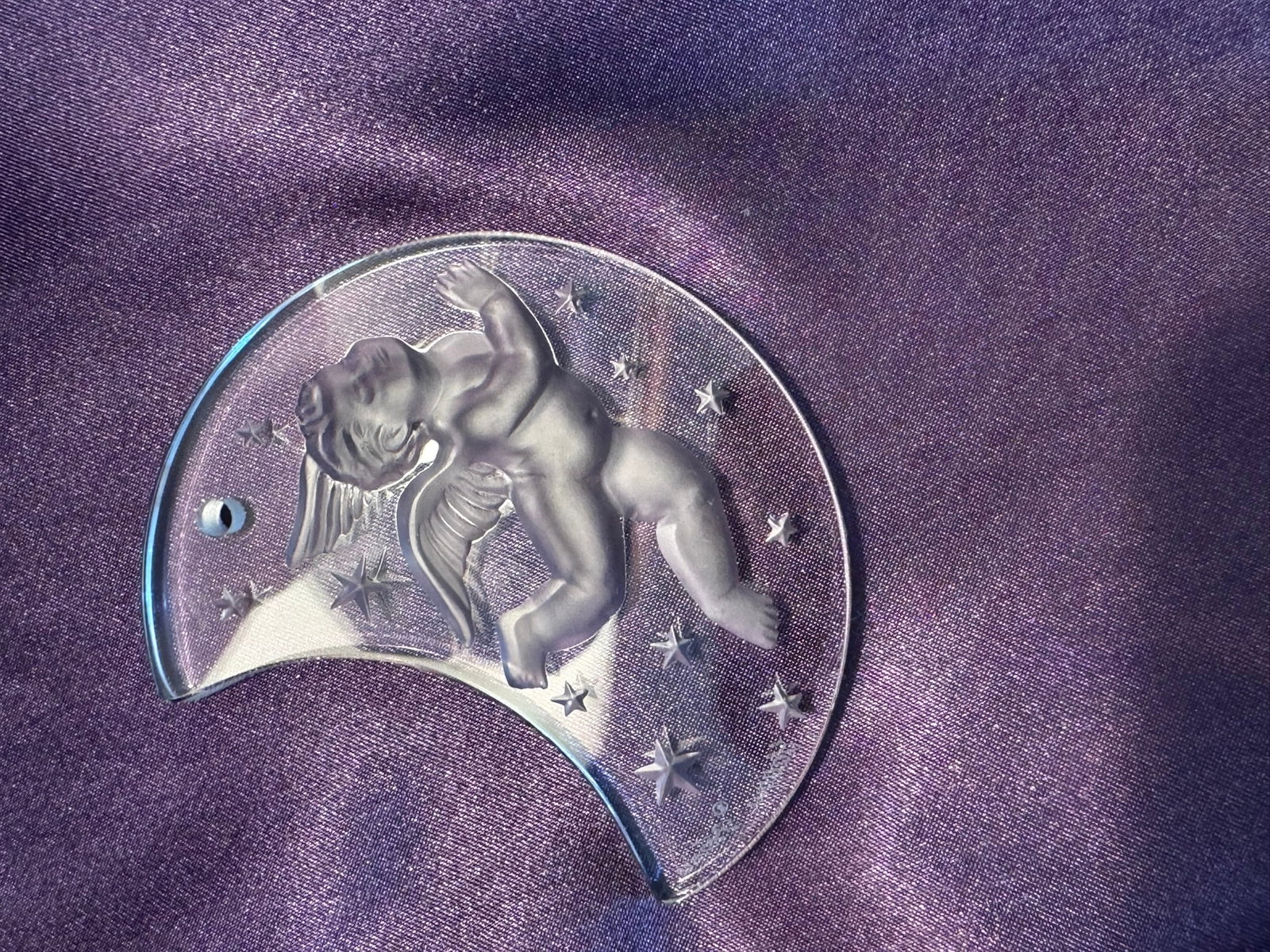 Lalique Crystal Cherub on Moon Ornament 1998: Exquisite Lalique France crystal holiday ornament featuring a frosted cherub/angel resting peacefully on a clear crescent moon surrounded by stars.