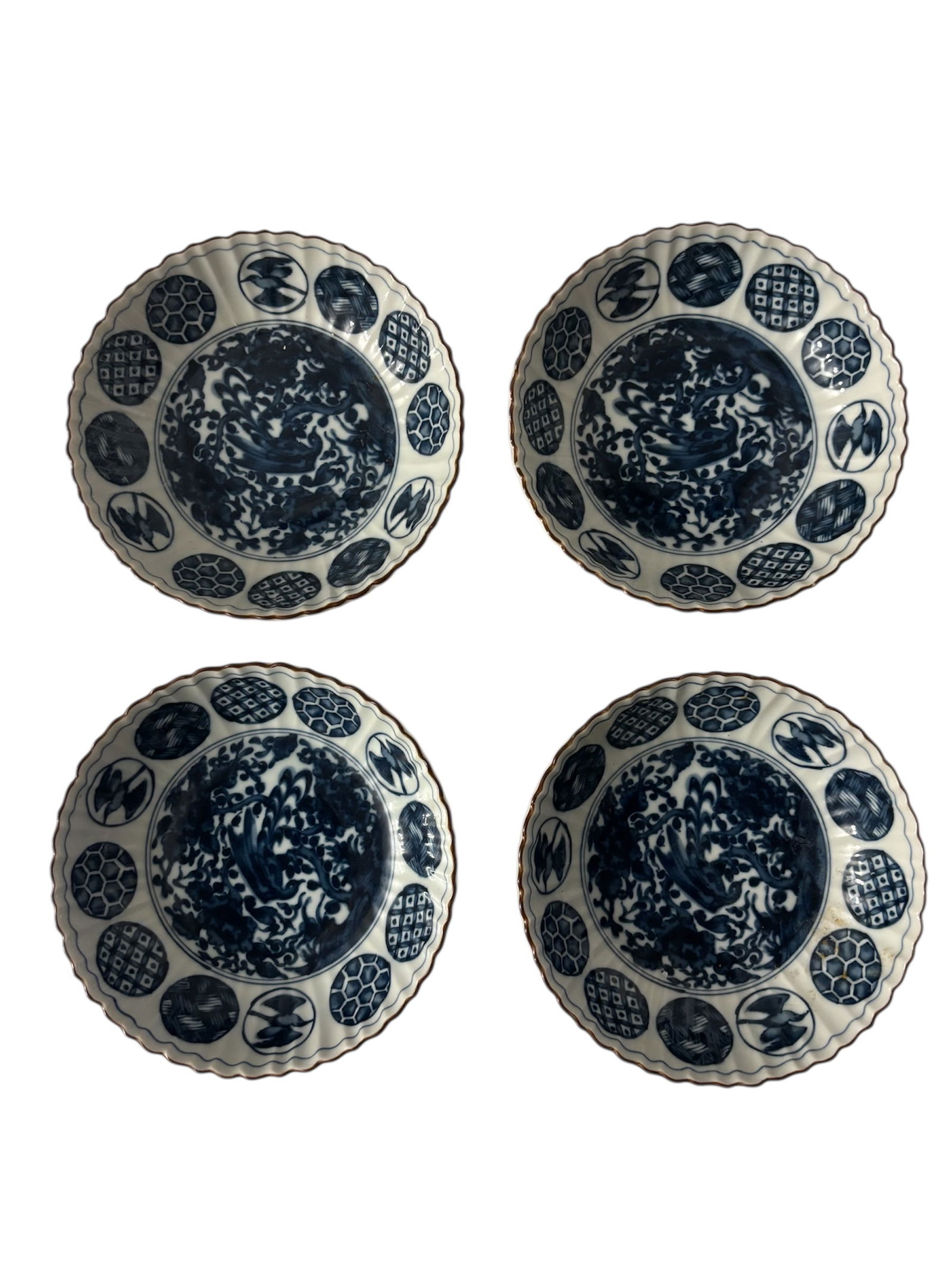 International Ching Te Chen Coupe Cereal Bowls: Set of 4 International Ching Te Chen 6" coupe bowls featuring blue and white depicting bird and floral motif, surrounded by various geometric and traditional Japanese patterns. This pattern is discont