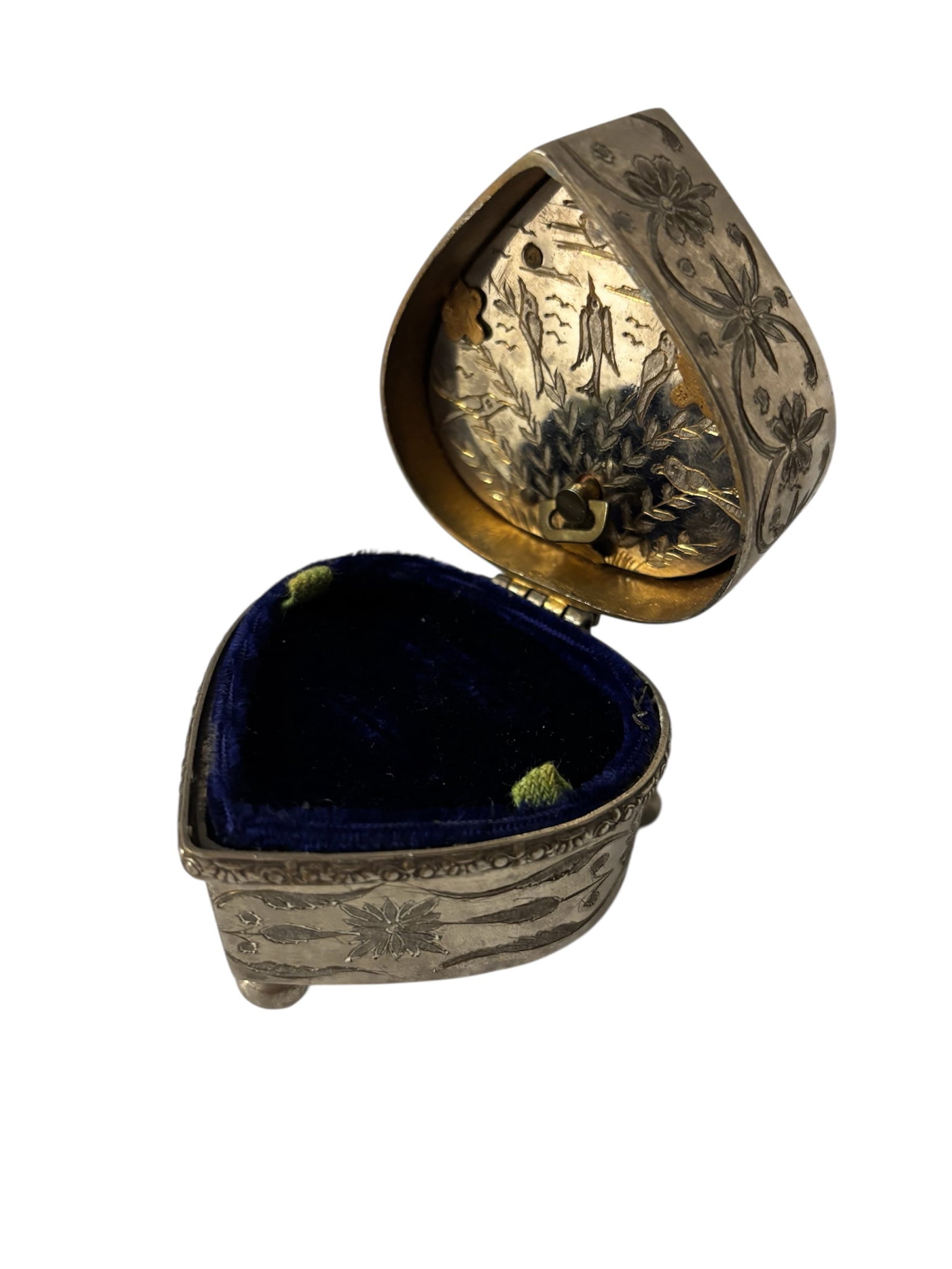 Embossed Heart Shaped Musical Ring Box: Features Victorian style with intricate engravings of a swan, crane other birds and flora design on the lid. Velvet ring insert can be removed and used as a trinket or jewelry box. Sides and base are