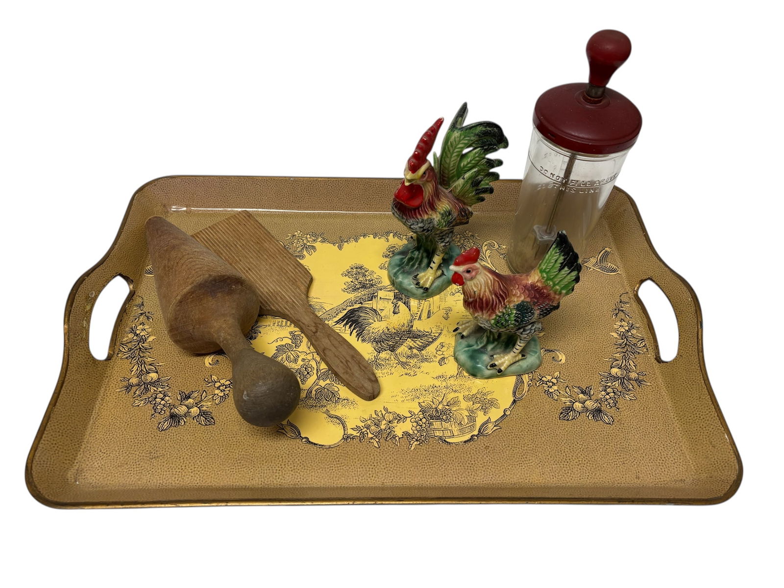 Collection of Vintage Roosters & Kitchenware: Including 2 Japanese early 1900s ceramic roosters, 2 vintage wooden utensils, a vintage glass and metal c. 1950 food chopper. Also included in lot laminated self handle serving tea tray with rooster t