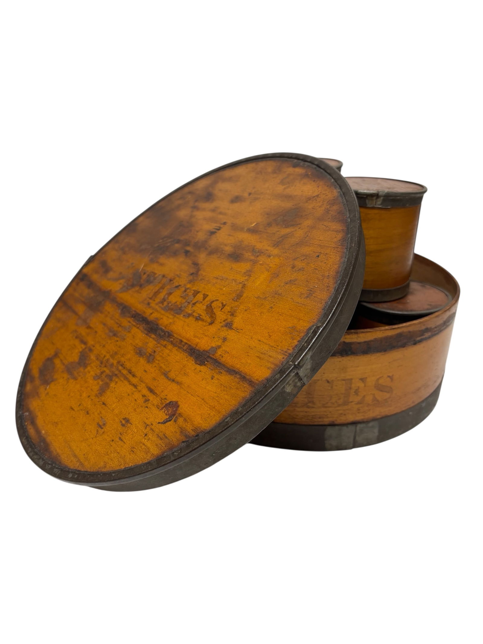 Antique Spice Case with Individual Spice Barrels: This unique antique spice case with "Spices" stamped on lid of large round case features metal frame with wood body and includes 7 spice barrels also stamped with individual spice name inside with rus