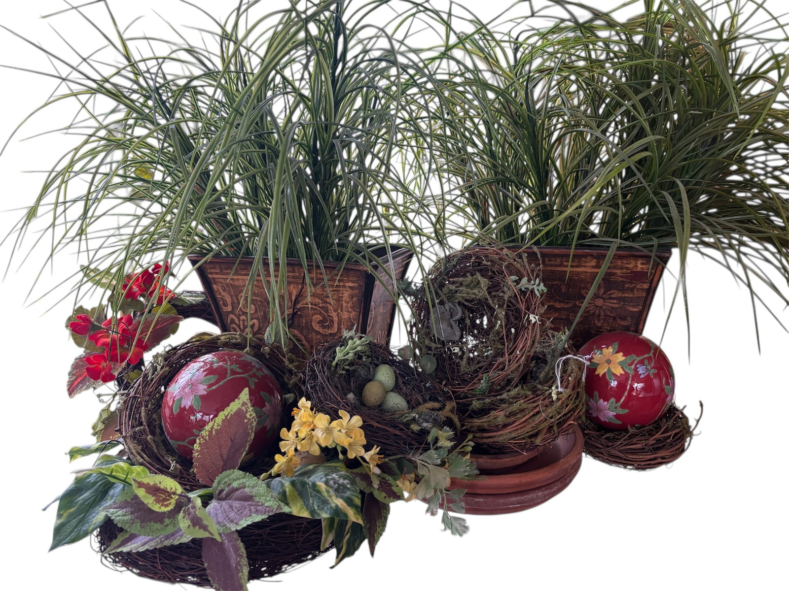 Collection of Assorted Faux Garden Foliage & Home Decor: Including 7 bird nests with greenery and some with faux eggs, 2 glazed ceramic decor balls with floral motif, assorted terra cotta underplots, and a pair of embossed platers with faux tall grass folia
