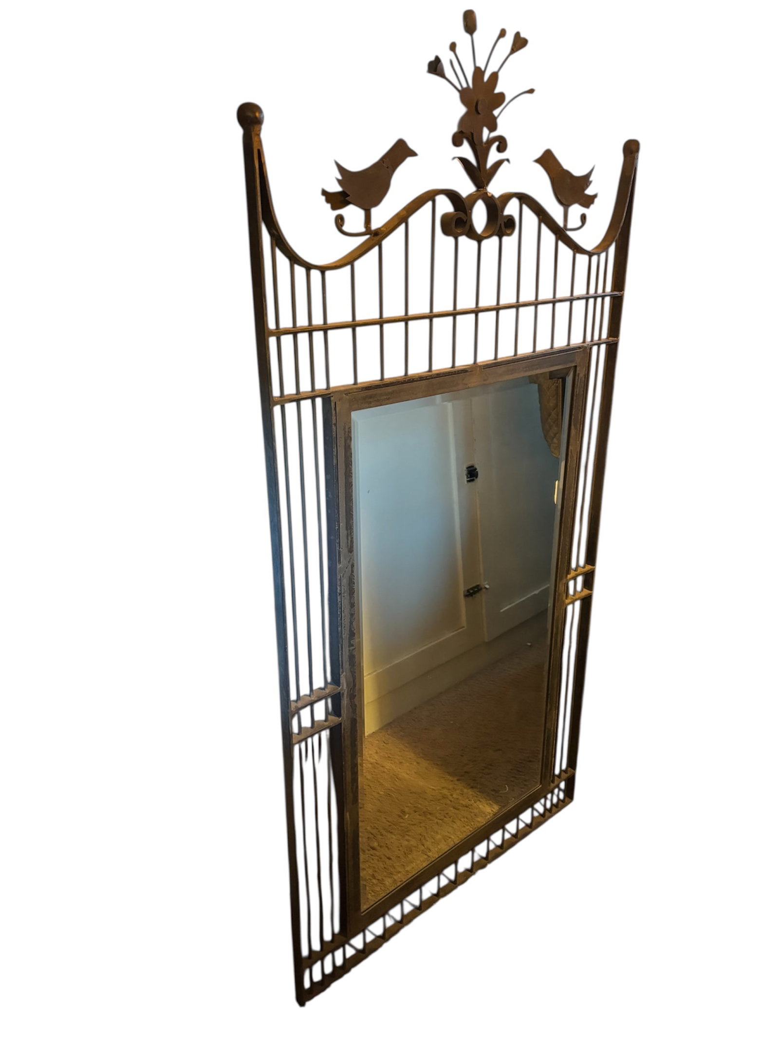59.5" Art Deco Iron Wall Mirror: Very heavy iron arch top with flowers and birds, rail inset design on frame with beveled glass mirror, ball finials with rustic charcoal grey finish.