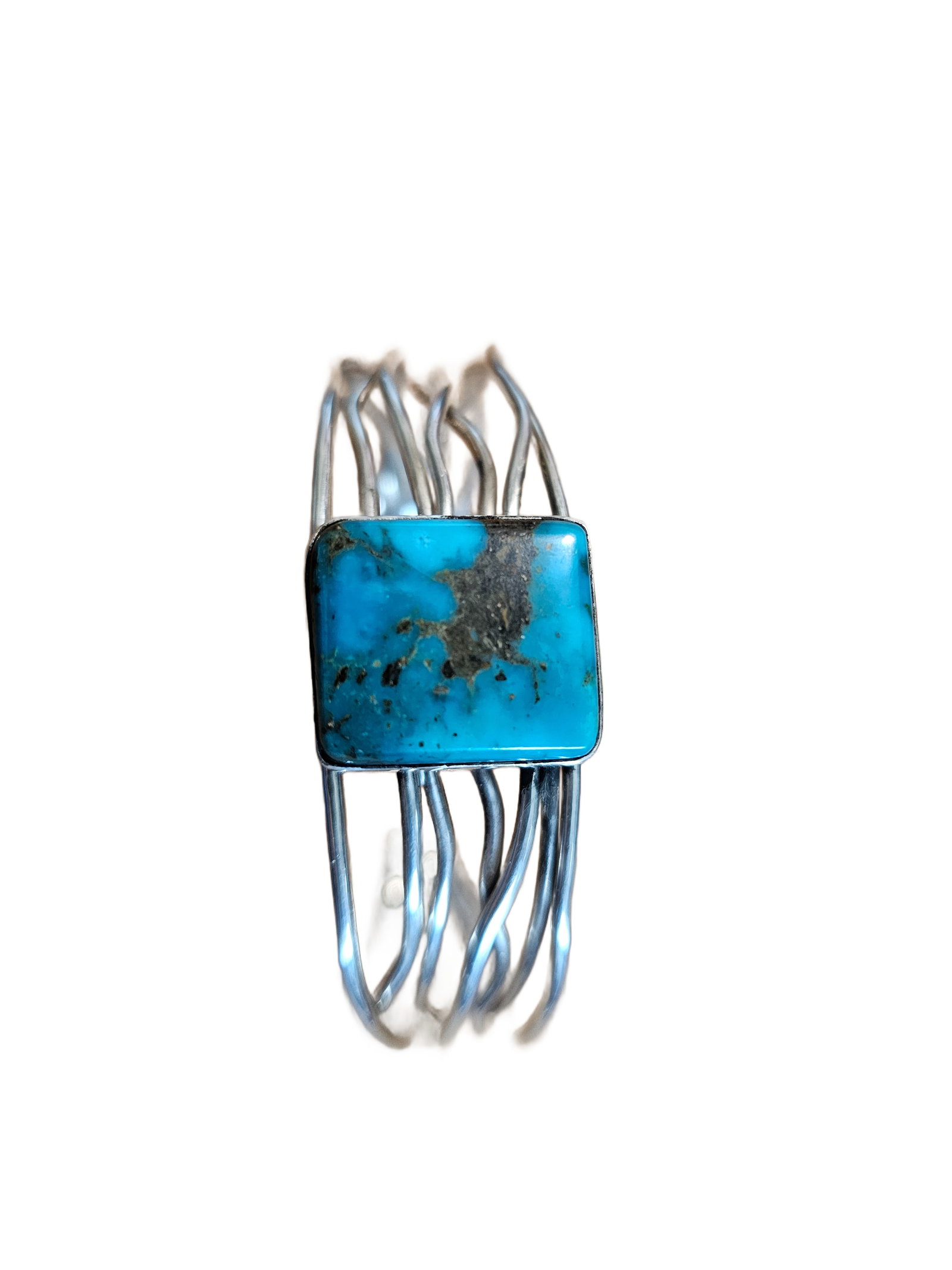 Sterling Silver Turquoise Cuff Bracelet Multi-Wire Design BW Hallmark 28.73g: Sterling silver cuff bracelet featuring a rectangular turquoise cabochon with vivid blue color and natural matrix.The stone is bezel-set and mounted on a striking multi-wire cuff composed of flowing, 
