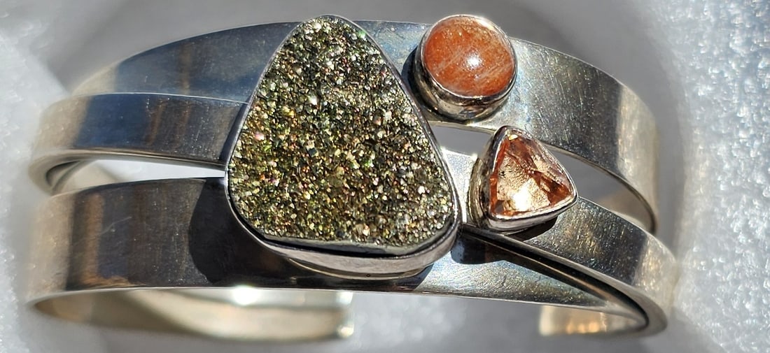 LILLY BARRACK STERLING SILVER DRUZY MULTI-STONE CUFF BRACELET: Striking contemporary sterling silver cuff bracelet by noted Southwest designer Lilly Barrack, featuring a bold, sculptural openwork design. The piece is centered by a shimmering druzy stone with natu
