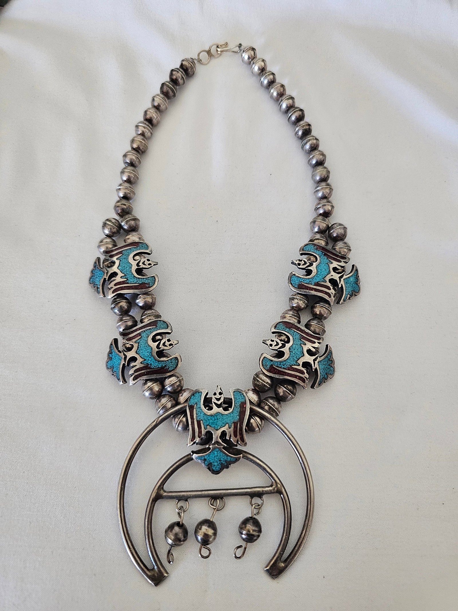 Very Vintage Sterling Silver Turquoise Coral Bird Naja Necklace 70g: Very vintage sterling silver turquoise and coral chip inlay bird naja necklace, with strong squash blossom-style elements and a wonderful early Southwest presentation. This piece appears consistent wi