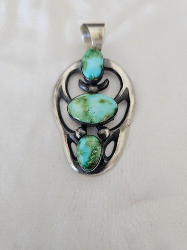 Chimney Butte Sterling Silver Sonoran Turquoise Pendant 47.73g: Substantial sterling silver pendant by Chimney Butte, featuring three Sonoran turquoise cabochons in distinctive blue-green tones with natural matrix and mineral variation.The stones are arranged vert