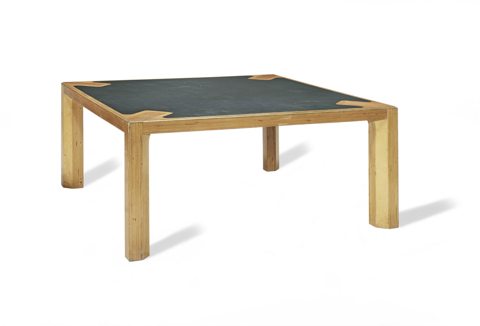 John Makepeace Table, commissioned by Clifford: John Makepeace Table, commissioned by Clifford Barclay, Upper Grosvenor Street, London, circa 1970 Birch-veneered plywood, Bridge of Weir leather. 71 x 152 x 153 cm Footnotes: Provenance Cliffor