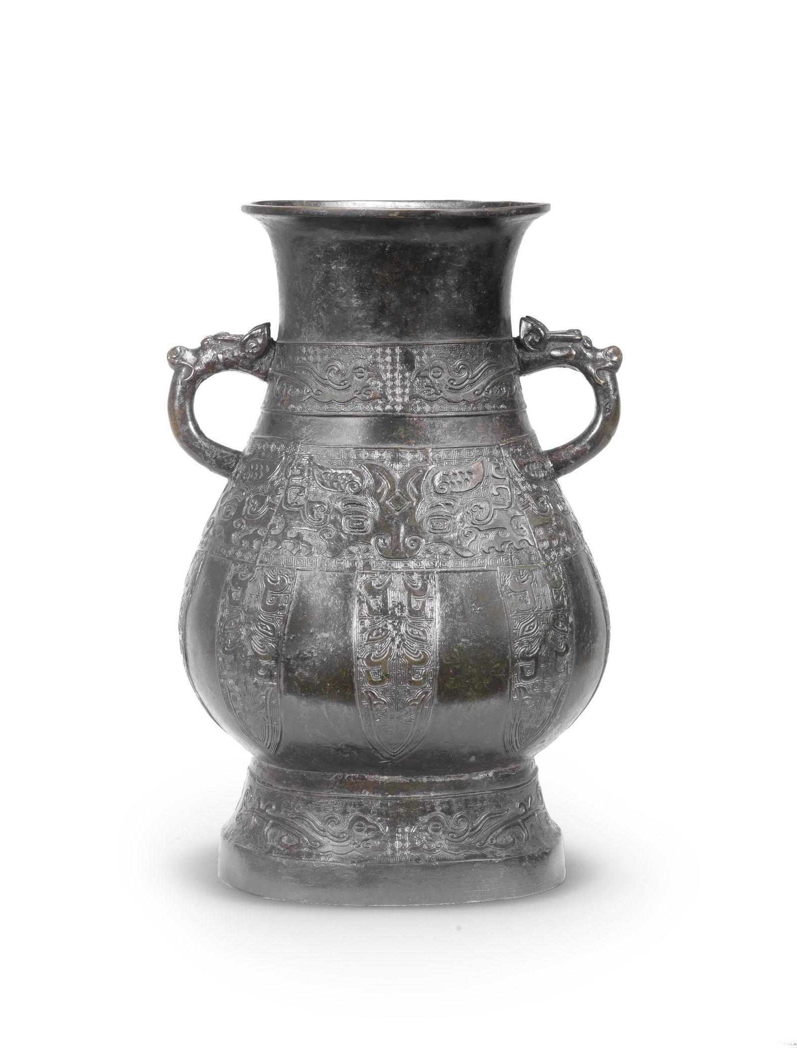 A RARE AND LARGE ARCHAISTIC BRONZE VASE, HU Ming: A RARE AND LARGE ARCHAISTIC BRONZE VASE, HU Ming Dynasty Of compressed form, with flaring neck and foot, the sides set with two stylised-dragon-head loop handles, the body finely cast with a broad ban