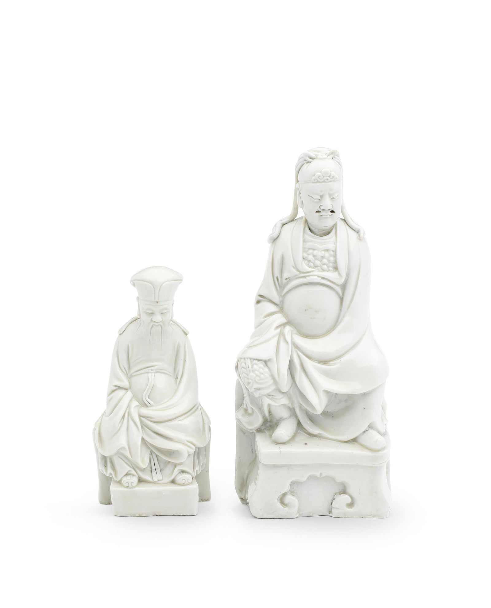 TWO BLANC-DE-CHINE SEATED FIGURES OF GUANDI AND TUDI (1 of 1)