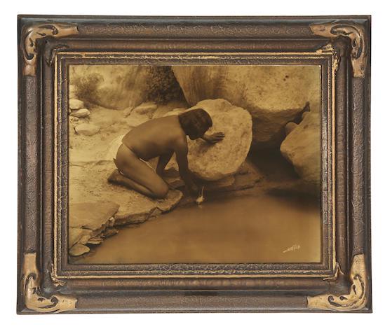 Edward S. Curtis (1868-1952): Edward S. Curtis (1868-1952) Depositing a Prayer Stick, c. 1921 Orotone, signed in the image. 8 x 10in (20.2 x 25.4cm); original Curtis Studio frame Footnotes Literature Edward S. Curtis: The North Am