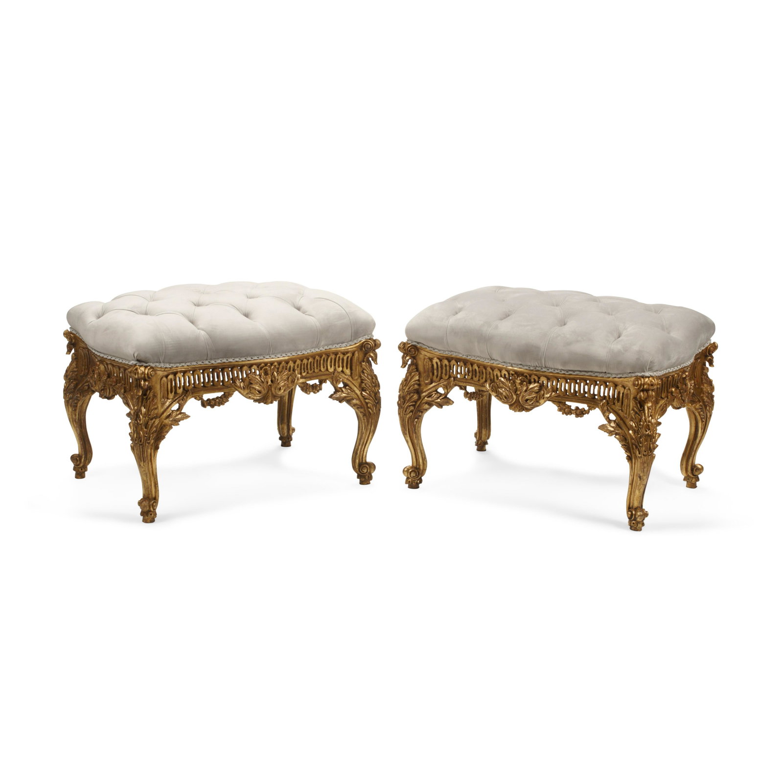 A PAIR OF ROCOCO STYLE TUFTED UPHOLSTERED GILTWOOD: A PAIR OF ROCOCO STYLE TUFTED UPHOLSTERED GILTWOOD STOOLS height 21 1/4in (54cm); width 29 1/2in (75cm); depth 21in (53cm) For further information on this lot please visit Bonhams.com