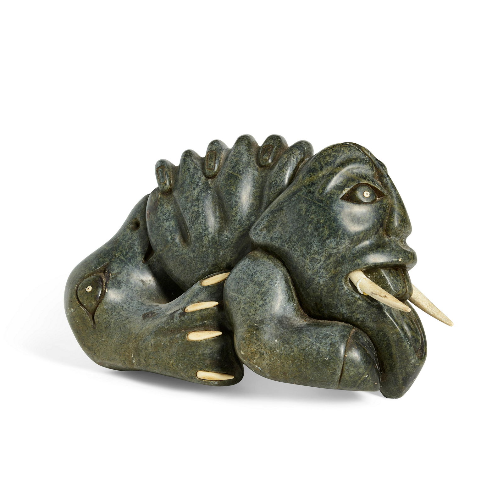 An Abraham Anghik Ruben sculpture: Abraham Anghik Ruben Inuit, Paulatuk, (b. 1951), a carved stone sculpture, a transformation figure, apparently unsigned. height 9 1/2in, width 14in Footnotes: Abraham Anghik Ruben (sometimes listed as