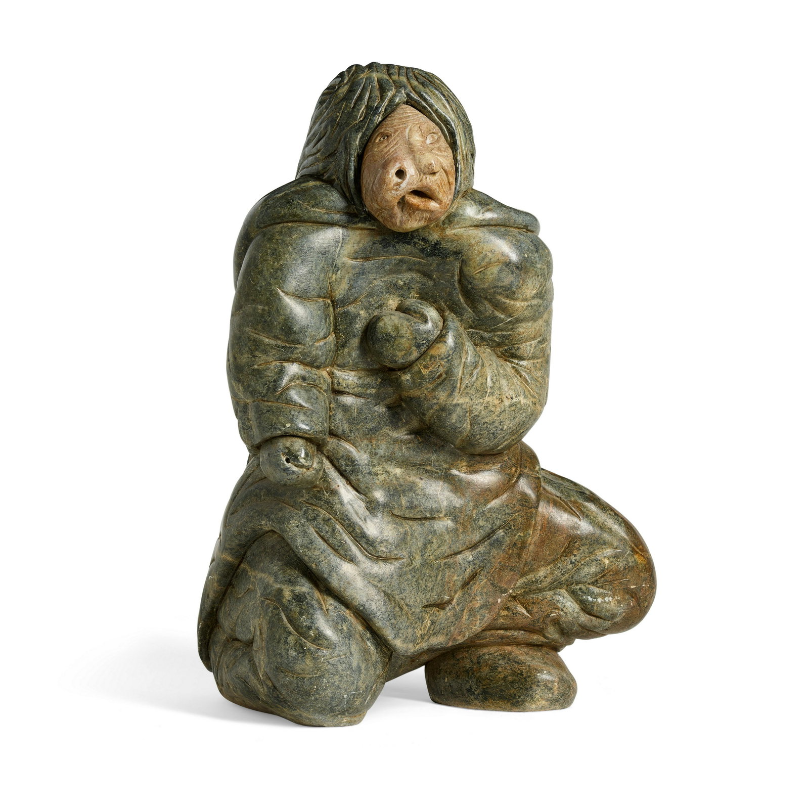 A Nick Sikkuark sculpture, 1991: Nick Sikkuark Inuit, Kugaaruk, Nunavut/Pelly Bay, (1943-2013), a carved stone sculpture, female shaman with helping spirit, 1991, dated and signed in syllabics on the underside. height 18 1/2in, width