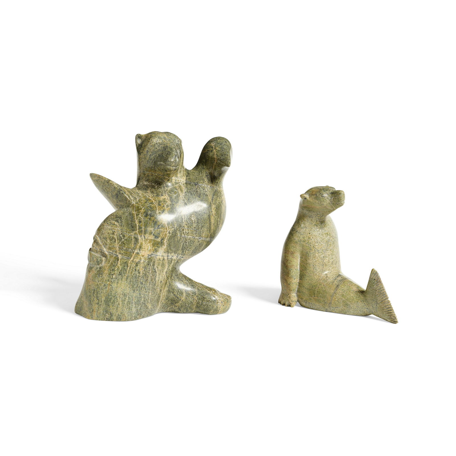 Two Inuit transformation figure carvings (1 of 3)